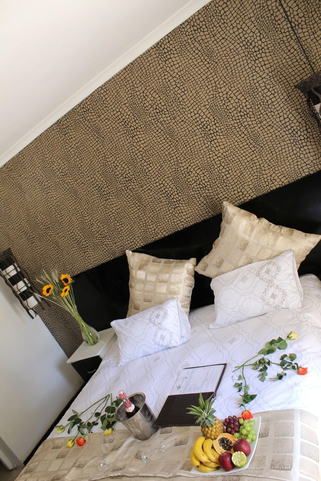 Africa Paradise - Airport Guest Lodge and Travel Centre