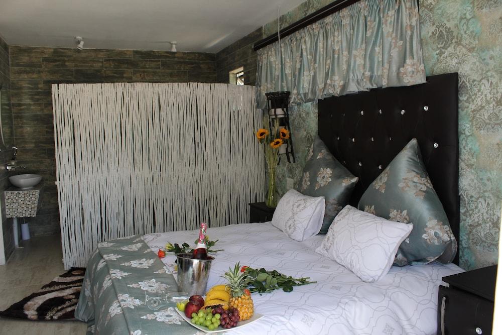 Africa Paradise - Airport Guest Lodge and Travel Centre
