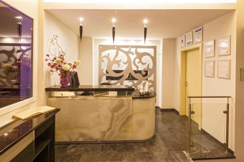Hotel First