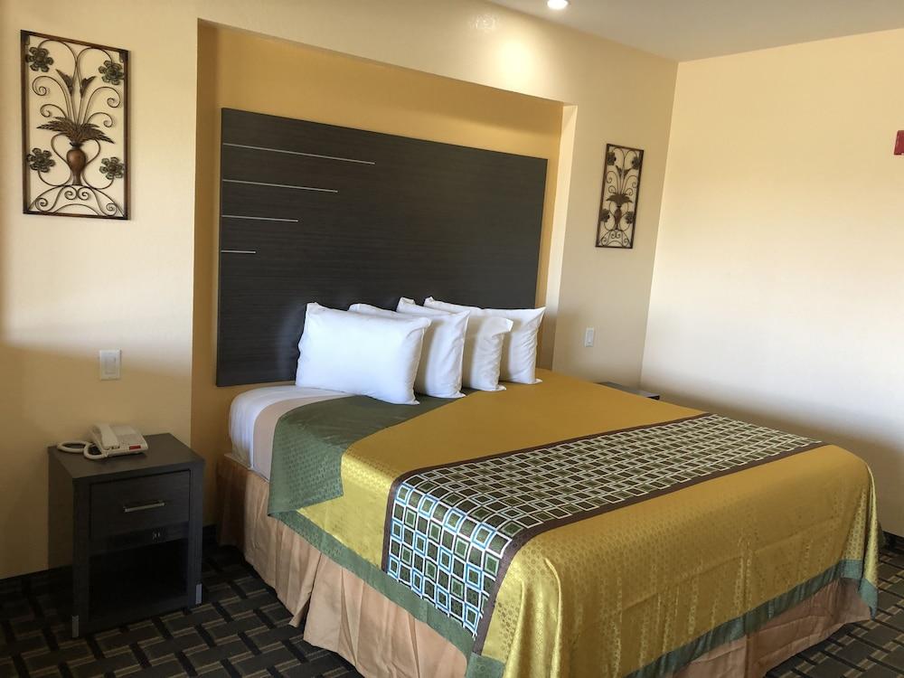 Homegate Inn & Suites