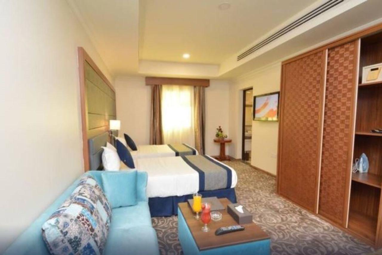 Grndeur East Hotel Suites