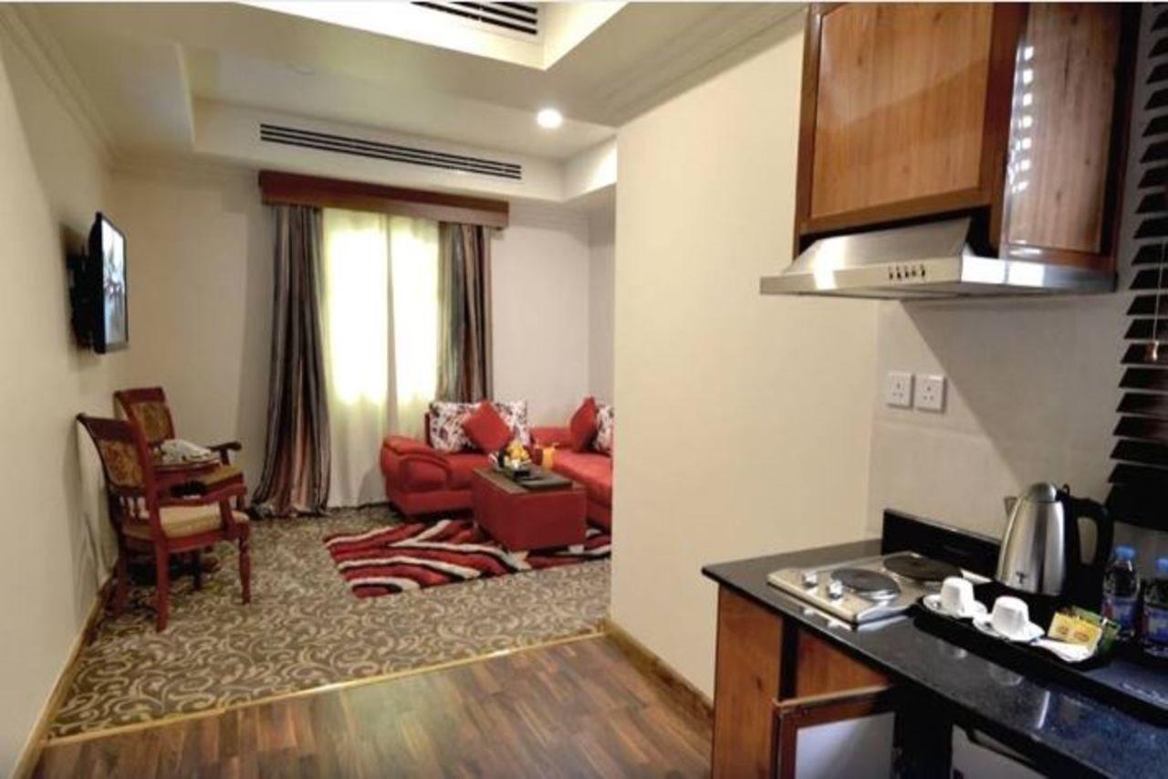 Grndeur East Hotel Suites