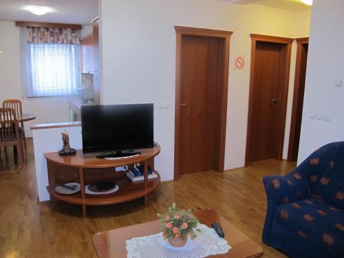 Apartmaji Sobe Ravbar