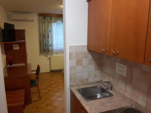 Apartmaji Sobe Ravbar