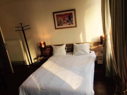 Appart-hotel Maison de la Lune - petite Auberge d'Etterbeek