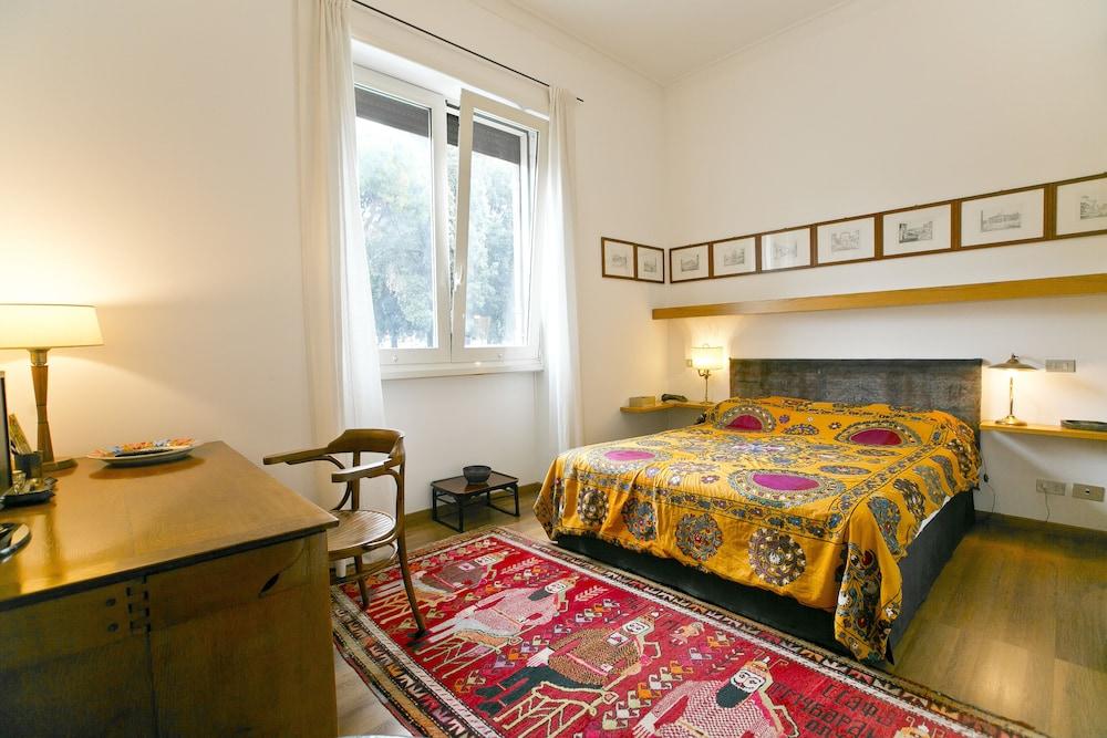 Aventino Orange Garden Suites