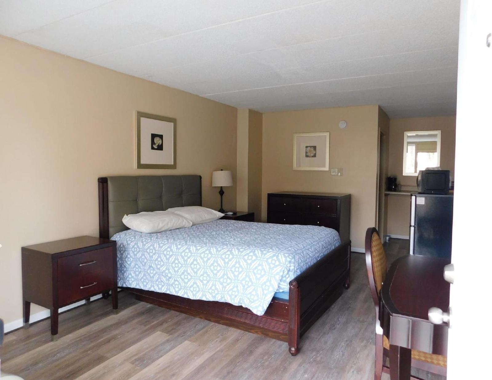 Apm Inn and Suites