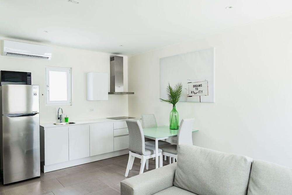 The Palm Leaf Apartments