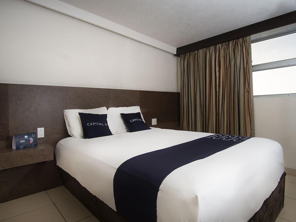 Capital O Hotel Rose