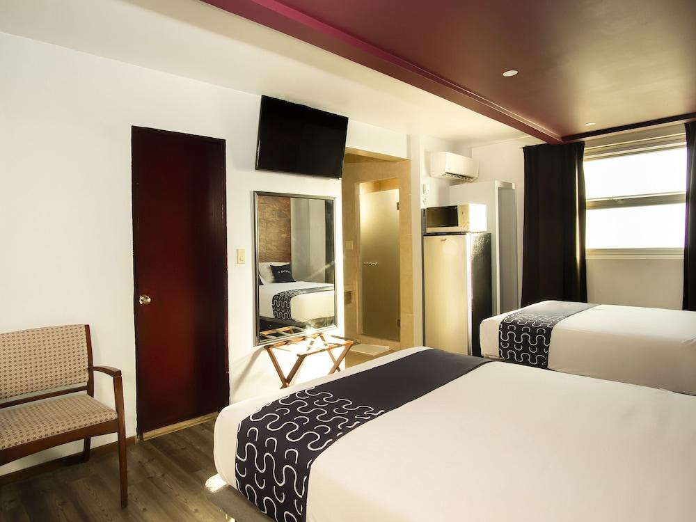 Capital O Hotel Rose