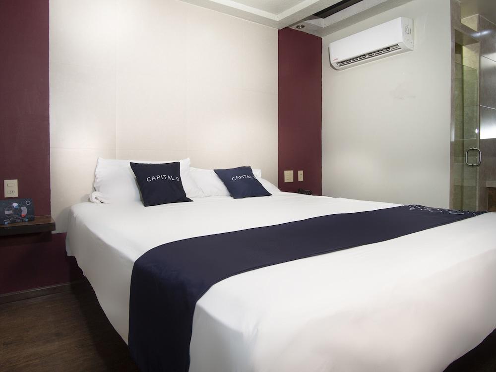 Capital O Hotel Rose