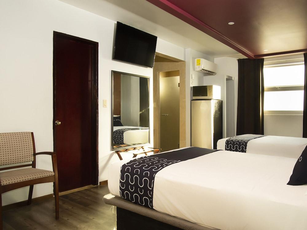 Capital O Hotel Rose