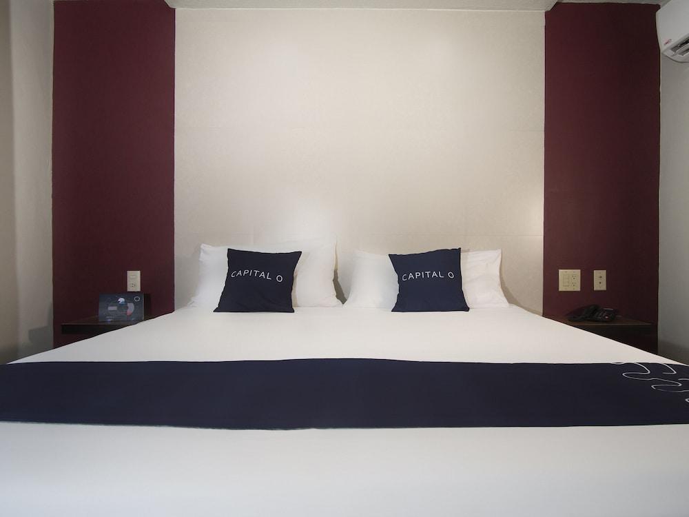 Capital O Hotel Rose