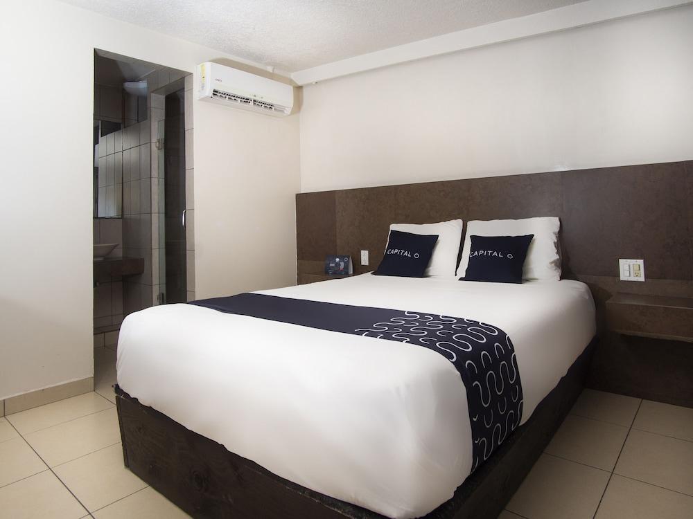 Capital O Hotel Rose