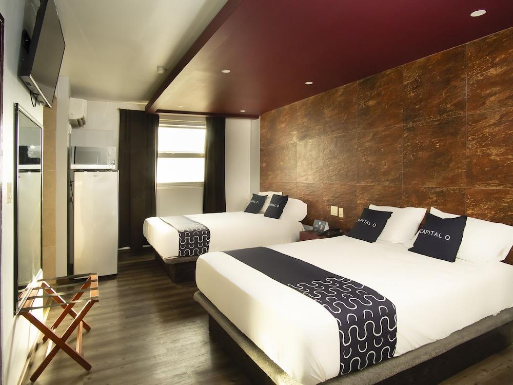 Capital O Hotel Rose