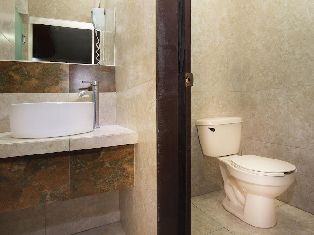 Capital O Hotel Rose