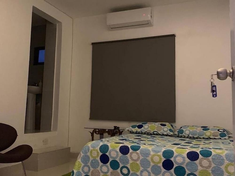 Malecon Rooms & Hotel