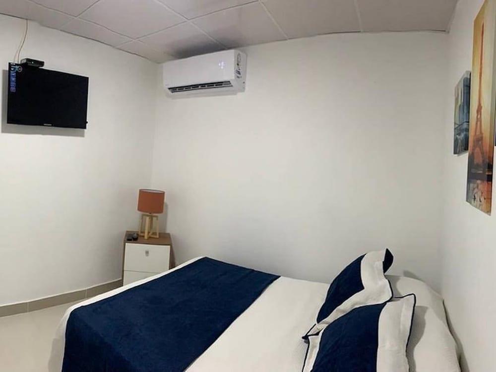 Malecon Rooms & Hotel