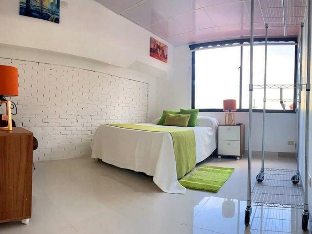 Malecon Rooms & Hotel
