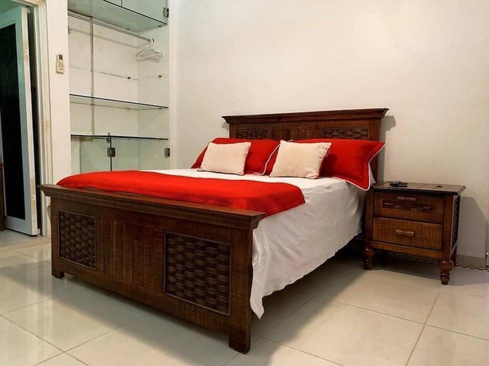 Malecon Rooms & Hotel