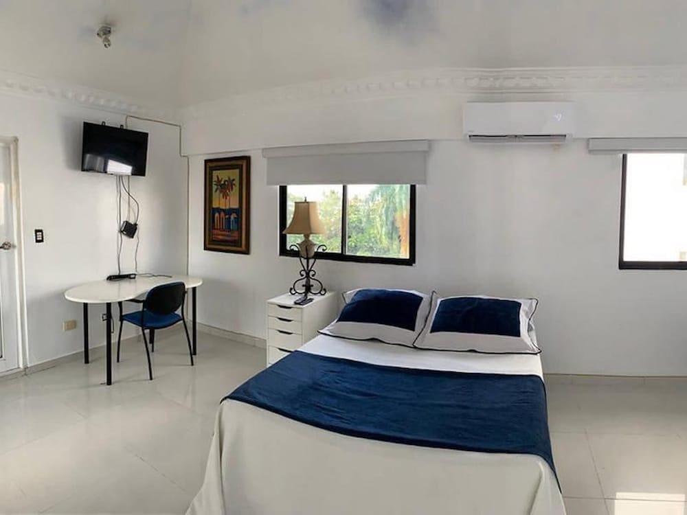 Malecon Rooms & Hotel