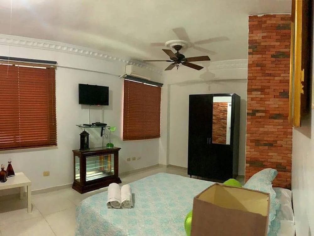 Malecon Rooms & Hotel