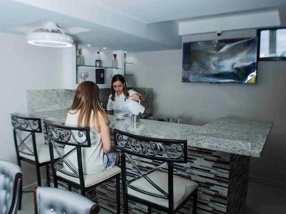 Malecon Rooms & Hotel